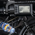 Macfox X2 eBike in black color shown inside its box, product packaging visible, barcode 810206240113