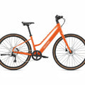 A Velotric Tempo Mid Step eBike in Sunset Tangerine color, side view, displayed against a plain background.