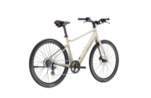 A sleek Velotric T1 ST Plus eBike in a modern setting, showcasing its lightweight frame, integrated battery, and minimalist design.