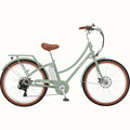Mint green Retrospec Beaumont Rev 3 electric bike with step-through frame, brown saddle and grips, rear rack, and whitewall tires, shown from side view.