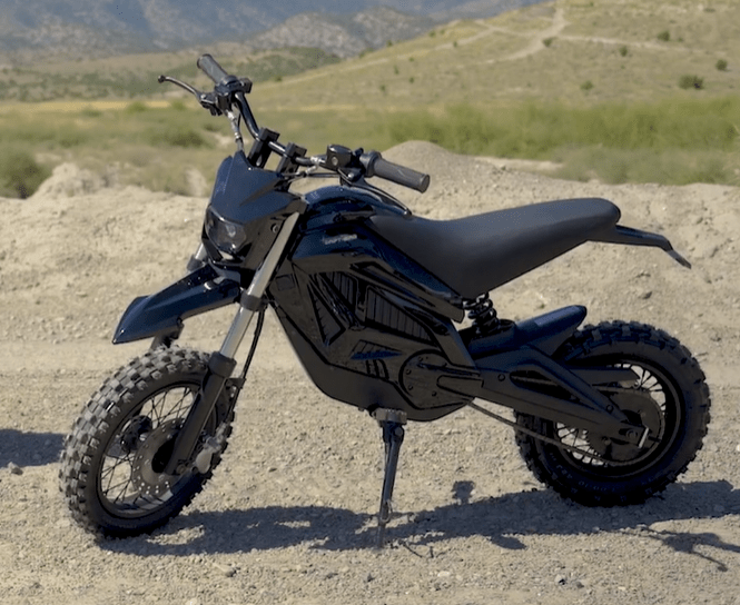 A black and red eMOTO eBike Drift Hero 800w dirt bike with rugged tires, sturdy frame, and electric motor, displayed on a white background.