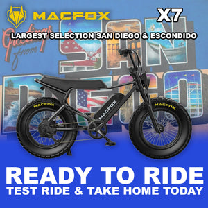 Black Macfox X7 eBike side view, showcasing rugged frame, thick tires, and modern design against a plain background.