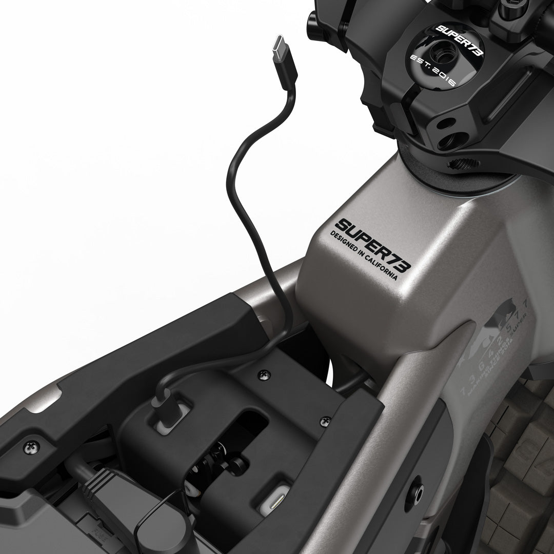 Super73 MZFT eMOTO eBike in Titanium Ore color, shown inside its original packaging box