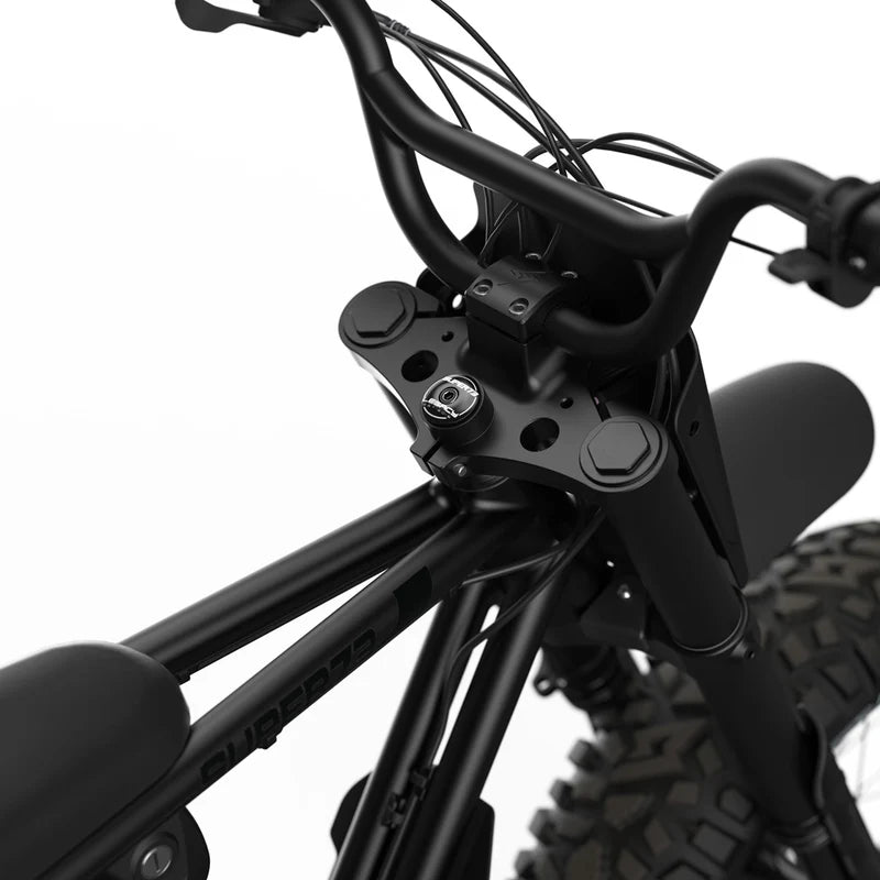 Side view of the Super73 Z Adventure Series SE electric bike in a rugged outdoor setting, showcasing its thick tires, sturdy frame, and adventure-ready design.