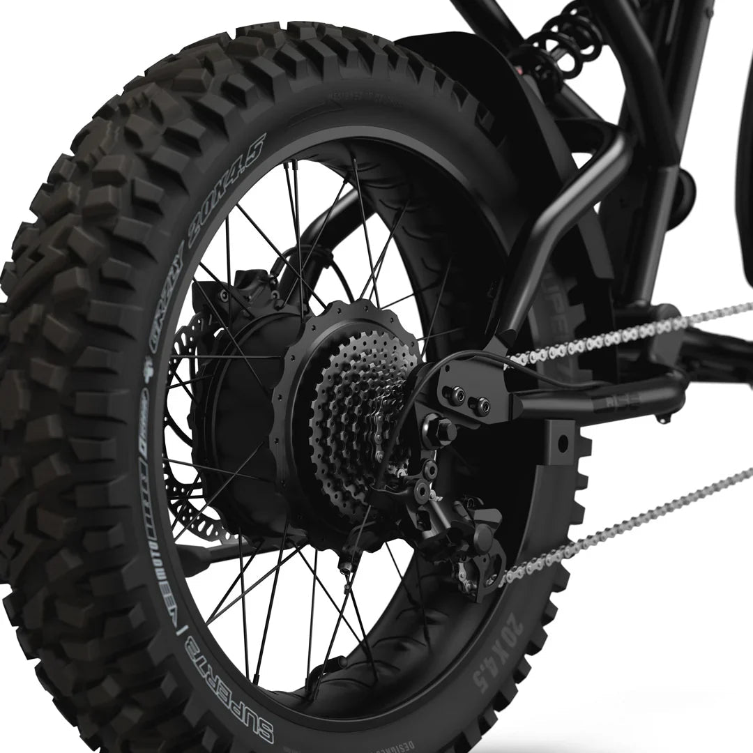 Side view of the Super73 R Adventure Series SE eMOTO eBike in a showroom, highlighting its rugged frame, thick tires, and sporty design.