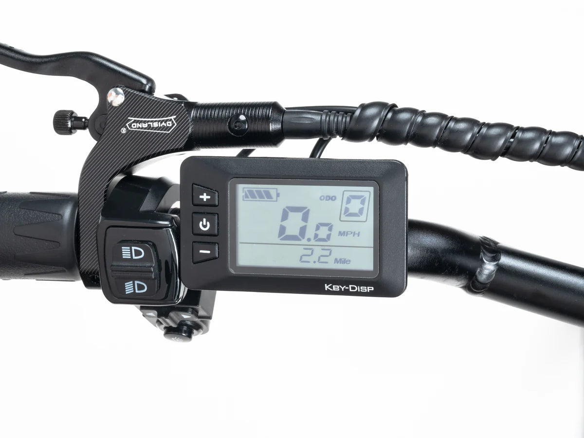 Alt text: Macfox X2 eBike display unit showing speed, battery level, and other ride information, mounted on handlebars.