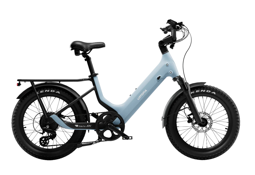 Side view of the Urtopia Carbon Joy eBike in Glacier Blue, showcasing its sleek carbon frame, integrated battery, and modern design against a plain background.