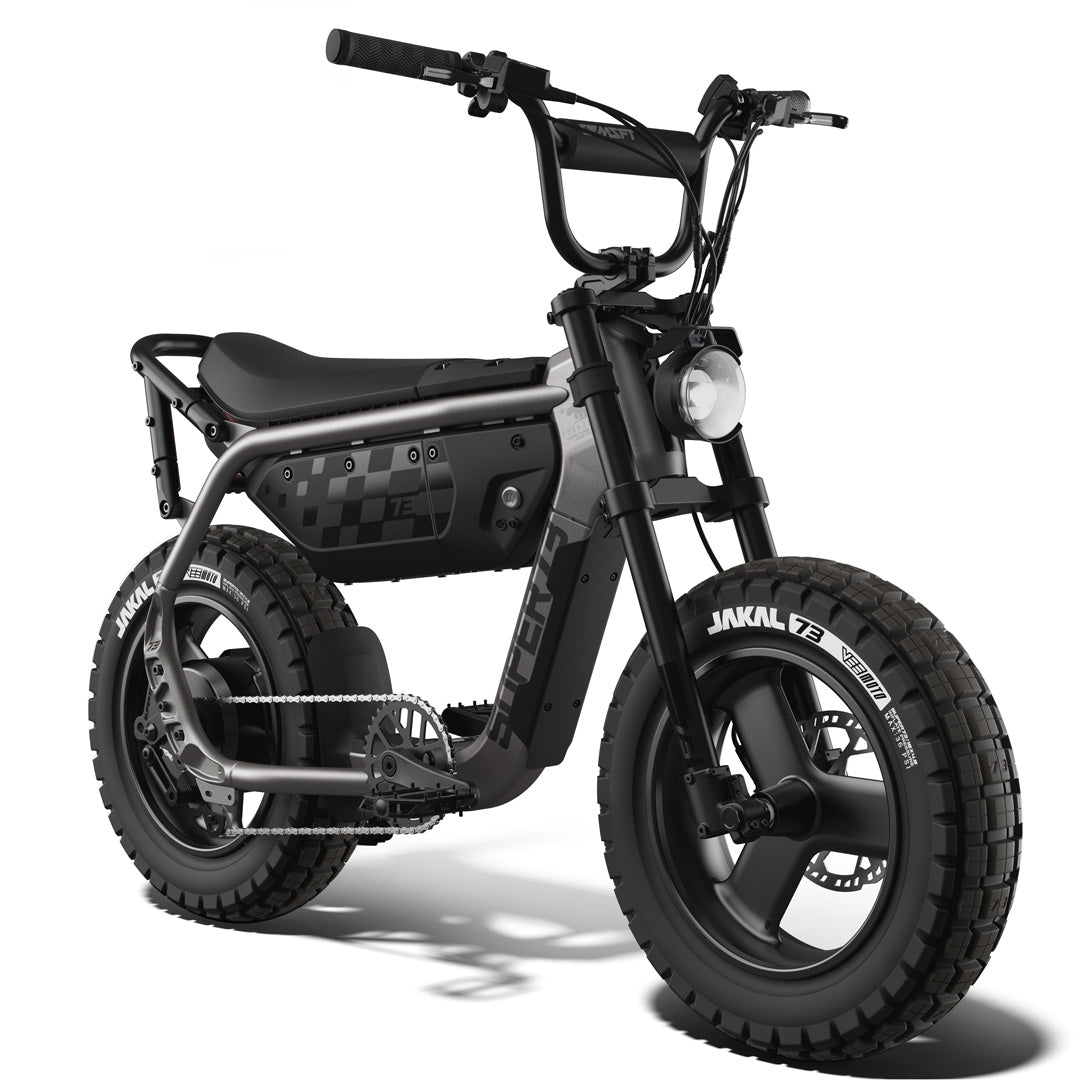 Super73 MZFT eMOTO eBike in Titanium Ore color, shown inside its original box with packaging materials.