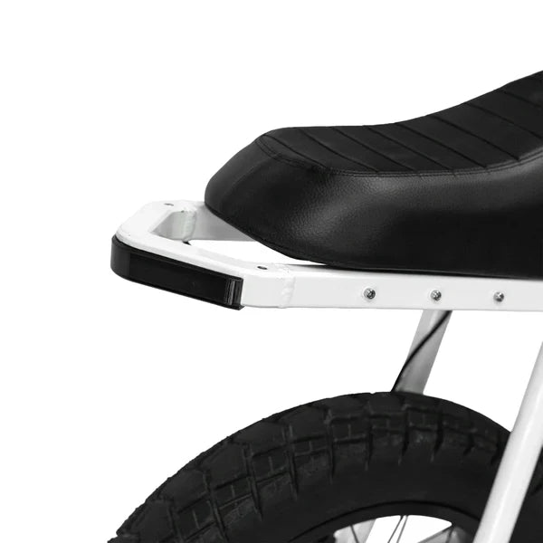 A black eMOTO eBike Strike Rhino electric bicycle shown from the side, featuring a sturdy frame, thick tires, and a rear cargo rack.