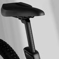 A Segway Xafari eBike parked outdoors, showcasing its sleek frame, wide tires, and integrated battery.