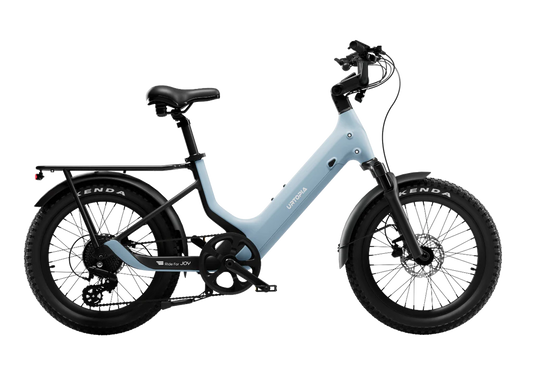 Side view of the Urtopia Carbon Joy eBike in Glacier Blue, showcasing its sleek carbon frame, integrated battery, and modern design against a plain background.