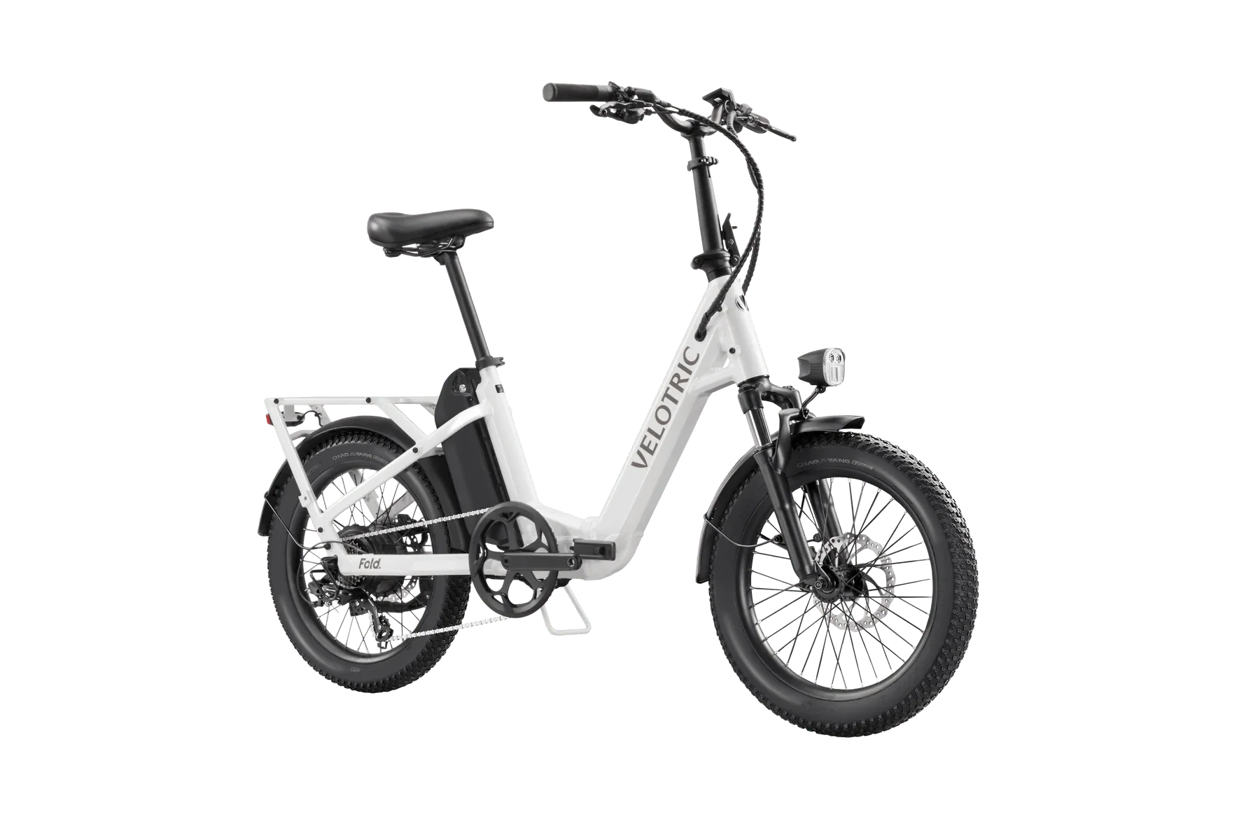 A compact, foldable Velotric Fold 1 eBike in matte black, shown fully assembled with its handlebars and frame folded for easy transport.
