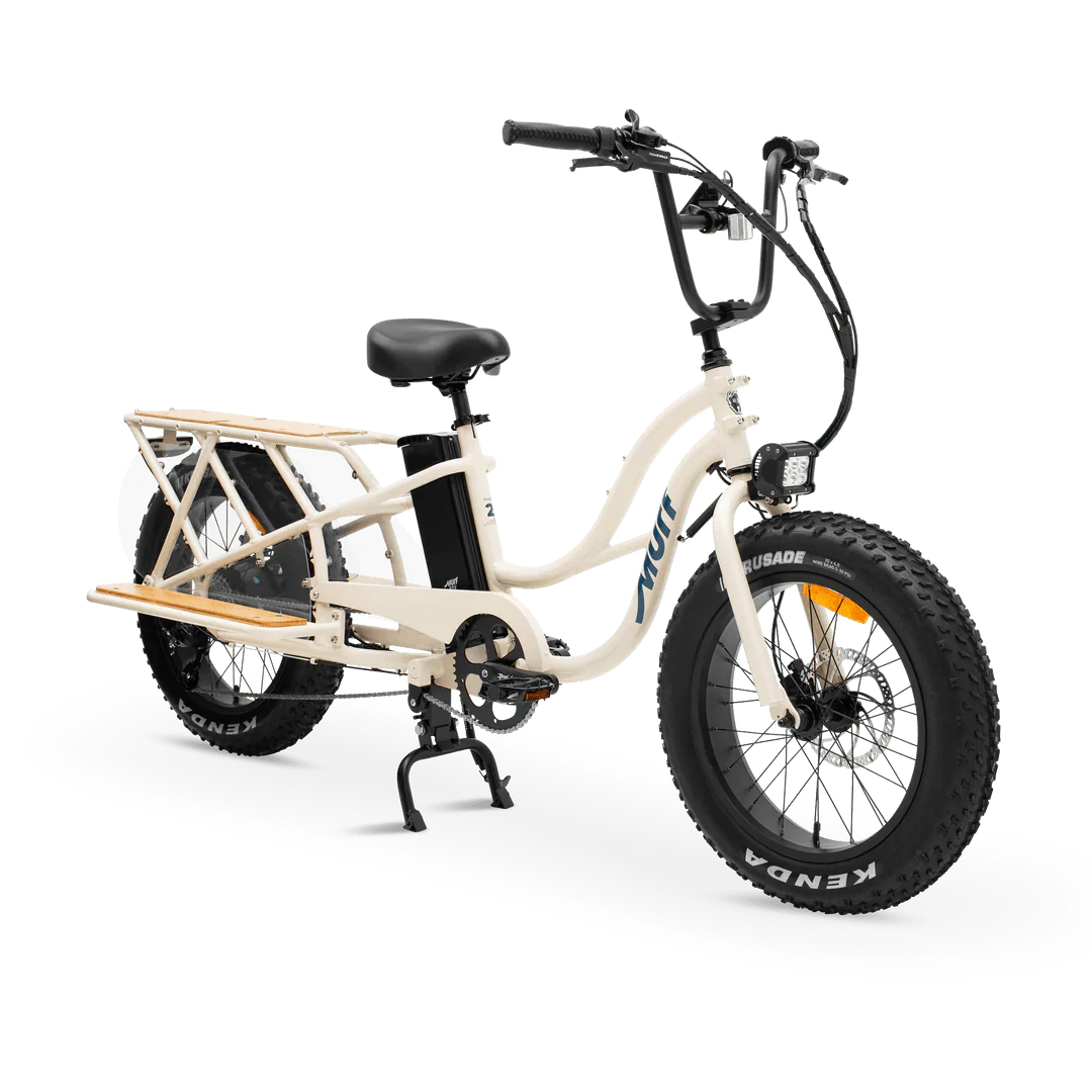 Bone-colored MURF Higgs Cargo fat tire eBike side view, showcasing sturdy frame, large tires, and rear cargo rack.