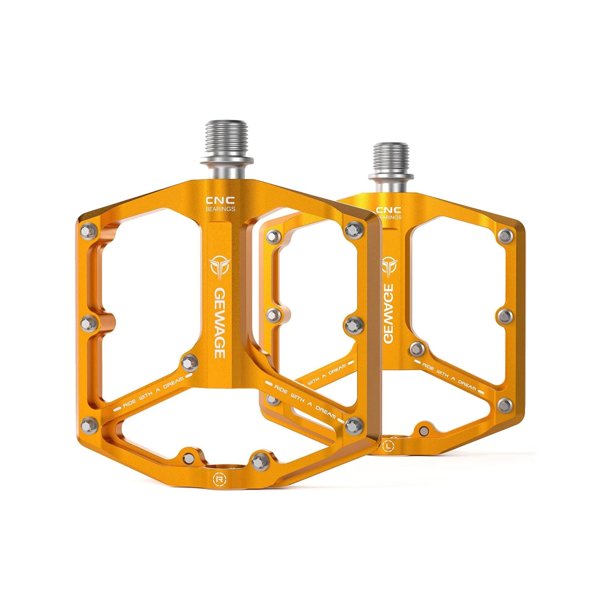 Orange alloy eBike pedals with textured surface, shown on a white background