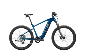 Royal blue Velotric Summit 1 eBike side view against a white background