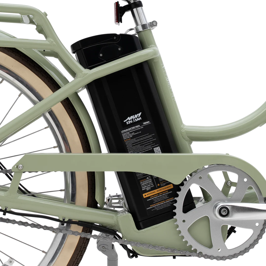 Side view of the Murf Gigi 2.0 eBike in a natural outdoor setting, showcasing its step-through frame, wide tires, and rear cargo rack.
