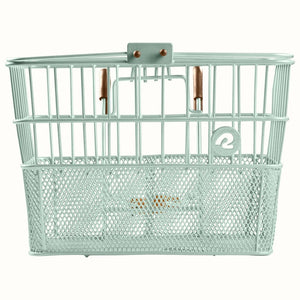 Retrospec Apollo steel bike basket in matcha green, attached to the front of an eBike