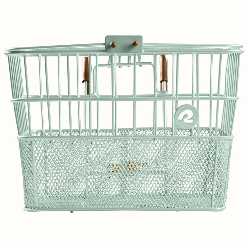 Retrospec Apollo steel bike basket in matcha green, attached to the front of an eBike