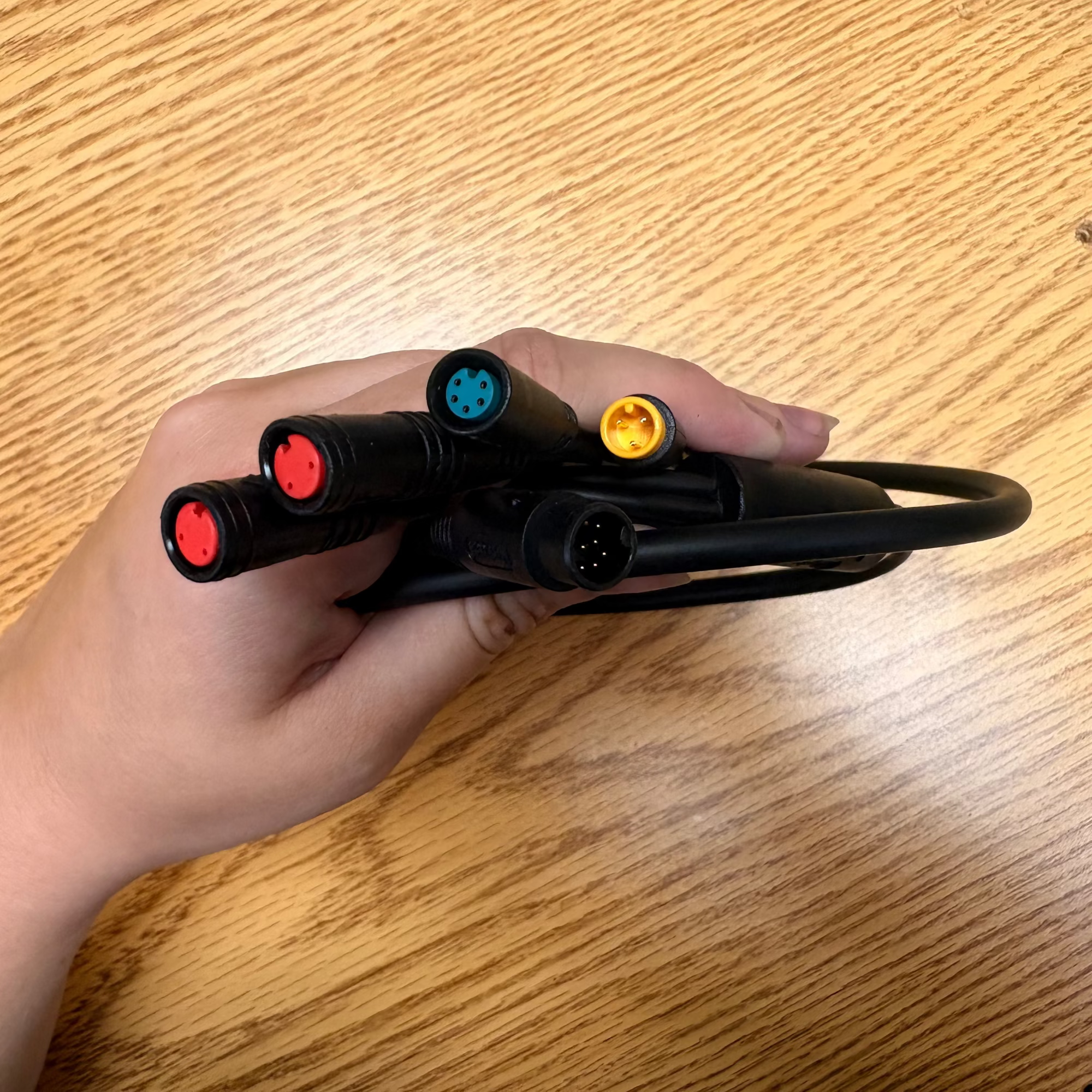 Product image of the Mokwheel eBike wiring harness designed for the Tarmac model, showing a bundle of black cables with connectors and plugs for electrical components.