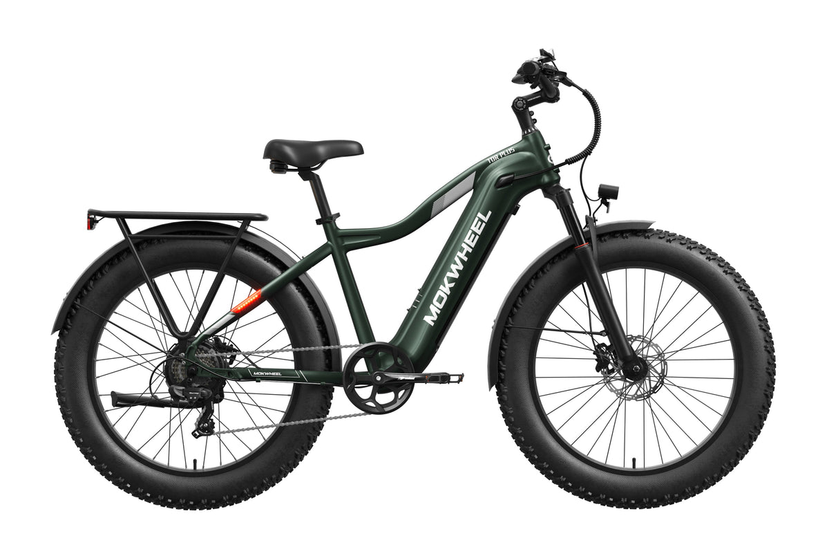 Green Mokwheel Tor Plus eBike side view, showcasing sturdy frame, thick tires, and integrated battery.