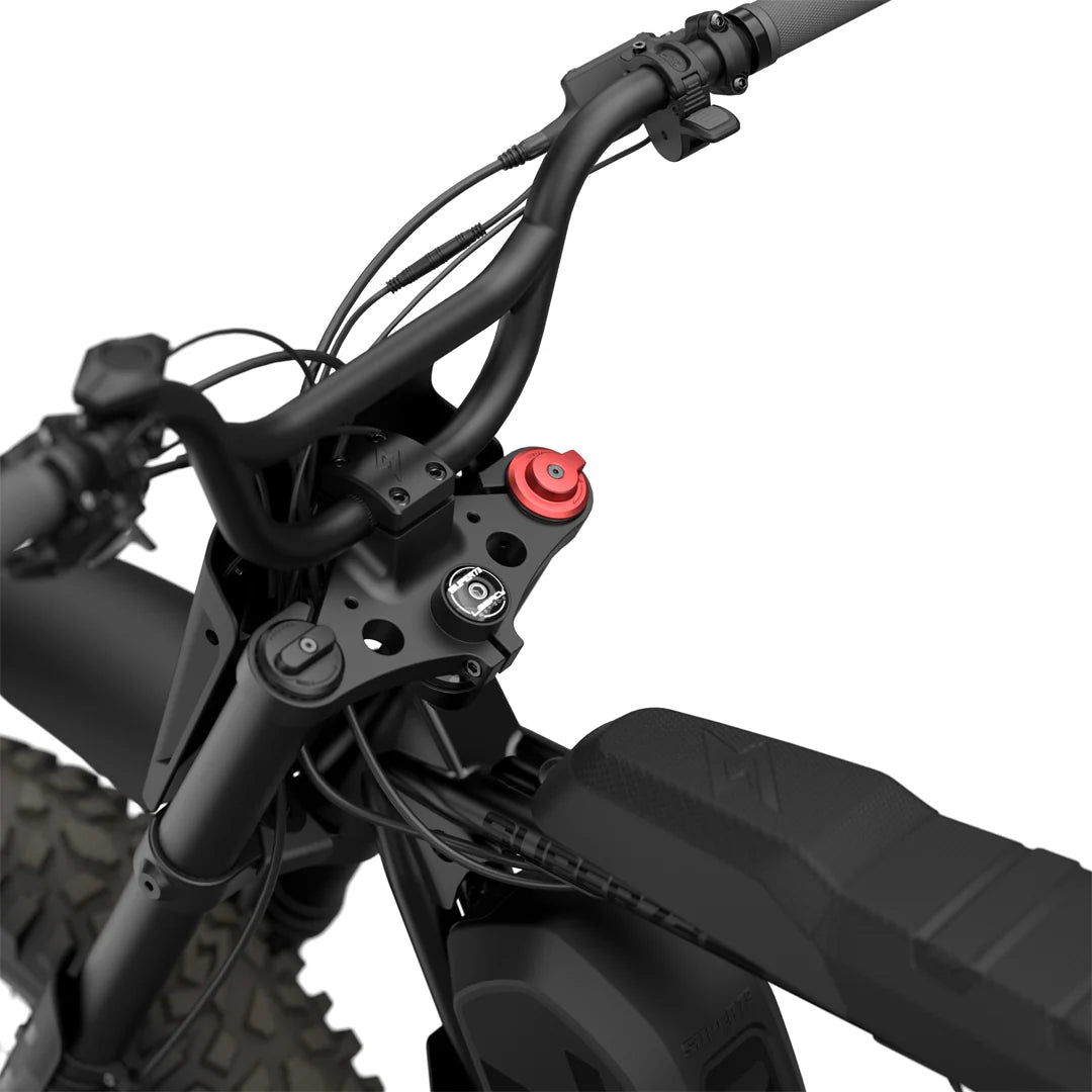 Side view of the Super73 R Adventure Series SE electric bike in a rugged outdoor setting, showcasing its thick tires, sturdy frame, and adventure-ready design.
