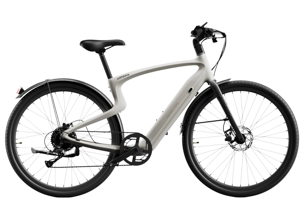 Side view of the Urtopia Carbon Classic eBike in creme color, showcasing its lightweight carbon frame, sleek design, and integrated components against a plain background.