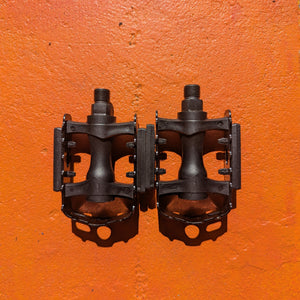 Close-up view of metal eBike pedals in Style 5, showcasing the textured surface and sturdy construction.