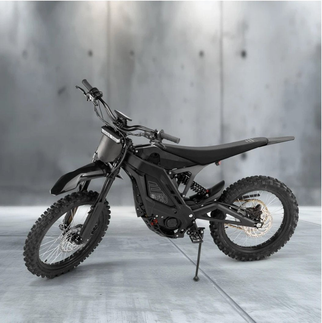 eMOTO eRide Pro SR Electric Dirt Bike in black and red, side view, showcasing 72v 3600WH battery and rugged off-road tires