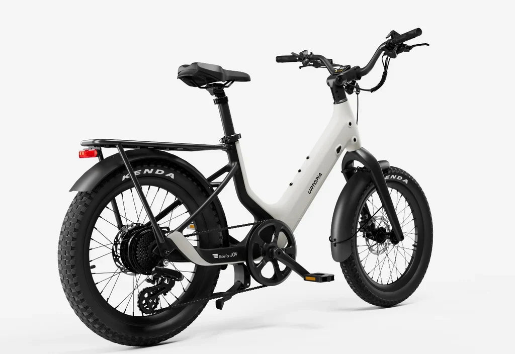 Side view of the Urtopia Carbon Joy Ultra eBike in black, showcasing its lightweight carbon frame, integrated battery, and sleek modern design against a white background.