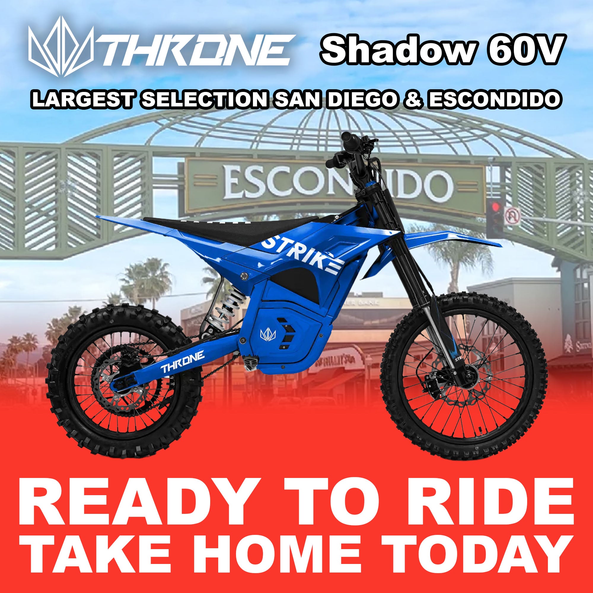 Blue eMOTO Strike Shadow SX 60V electric motorcycle, side view, parked on a plain background