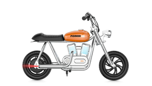 Orange eMOTO Hyper Gogo Pioneer 12 Plus electric bike without training wheels, side view, app-compatible model