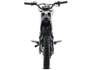 Side view of the eMOTO Stomp Ebox V3 60 electric dirt bike in black and green, showing its frame, wheels, and suspension system.