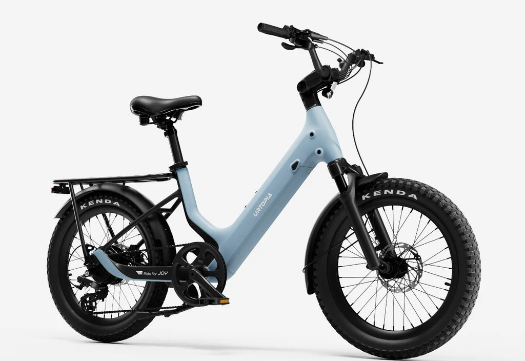 Urtopia Carbon Joy eBike in Glacier Blue, side view showcasing sleek carbon frame and modern design