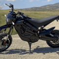 A black eMOTO eBike Drift Hero 800w dirt bike with rugged tires, sturdy frame, and electric motor, displayed on a white background.