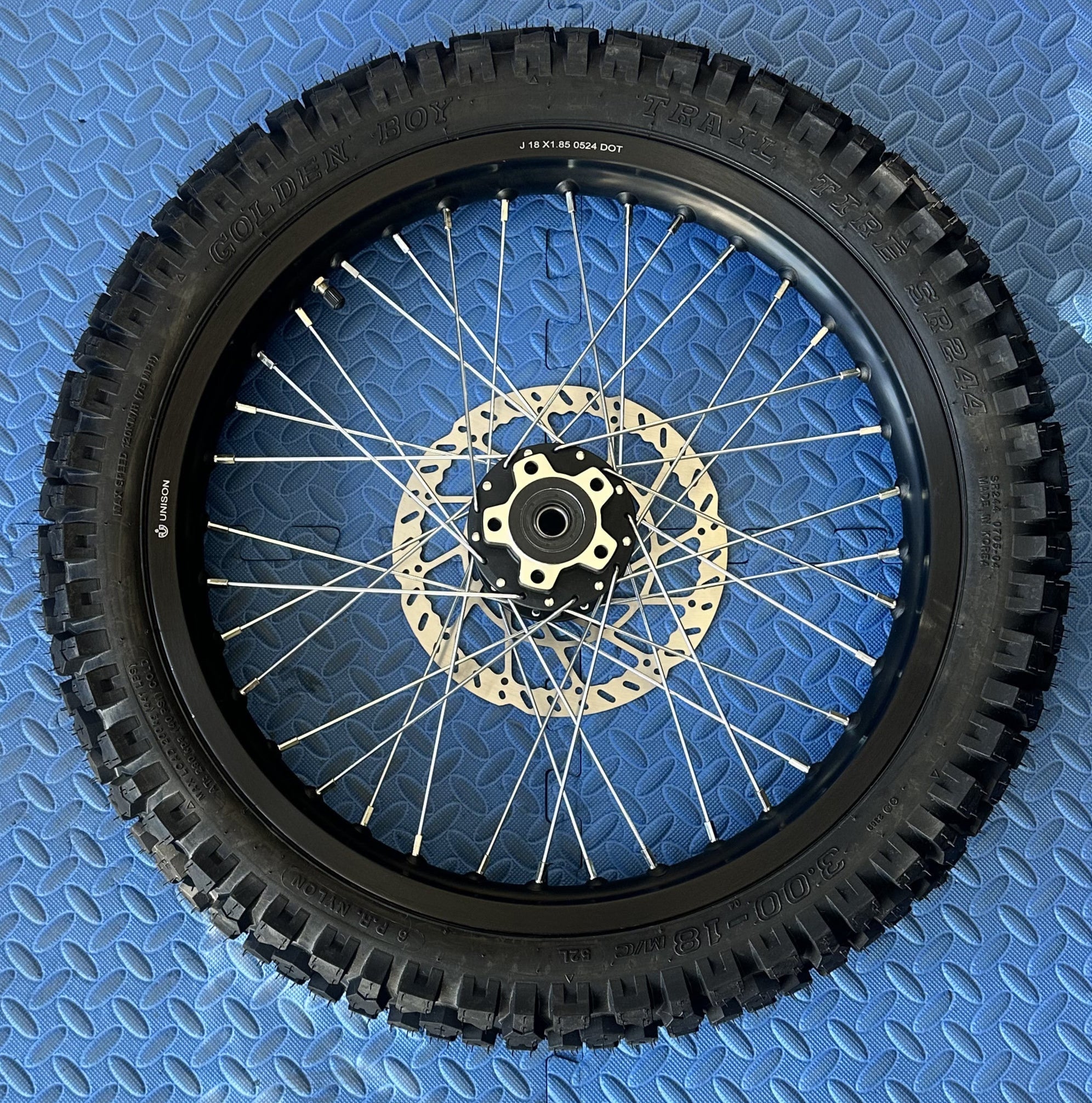 Product image of the eMOTO Surron eMoto Wheel Set featuring a Shinko 244 Dual Sport 18-inch rear wheel and tire set for e-moto bikes, shown without rotor or sprocket.