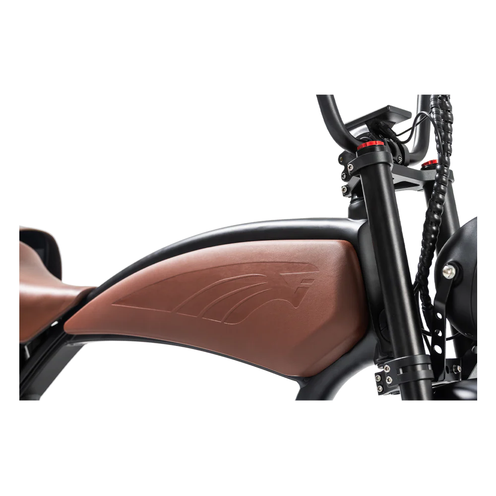 Brown eBike Revi Prowler electric bicycle side view with fat tires and step-through frame