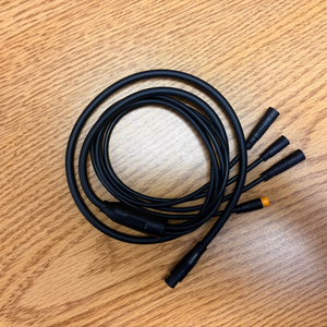 Product image of the Mokwheel eBike wiring harness designed for the Tarmac model, showing a bundle of black cables with various connectors and plugs.