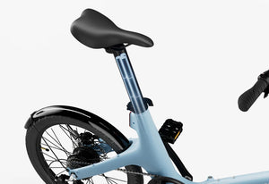 Urtopia Carbon Fold Step Thru eBike in Glacier Blue, side view, folded for compact storage