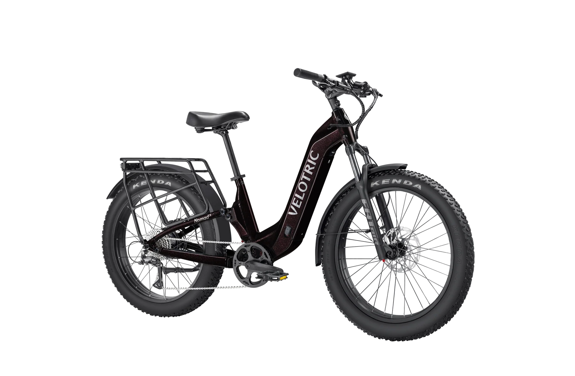 Side view of the Velotric Nomad 2X eBike in matte black, showing its fat tires, front suspension fork, integrated battery, and rear cargo rack.