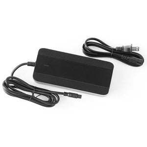 Super73 eBike charger, 54.6V 3A, black rectangular unit with attached power cord, shown from an angled side view.