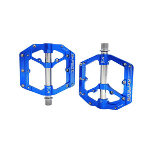 Blue alloy bicycle pedals, side view, labeled as "Blue 6" on a white background.