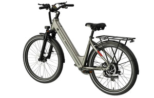 White MOKWHEEL Asphalt ST 500W step-thru urban electric beach cruiser eBike with 27.5x2.4 tires, side view on plain background.