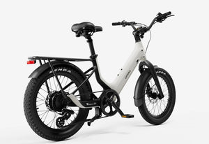 Side view of the Urtopia Carbon Joy eBike in creme color, showcasing its lightweight carbon frame, sleek design, and integrated battery on a white background.