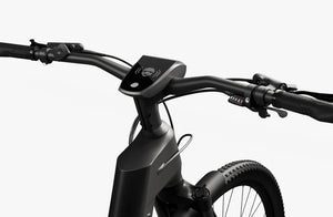 Side view of the Urtopia Fusion GT eBike in Blazing Black, showcasing its sleek frame, integrated battery, and modern design against a plain background.
