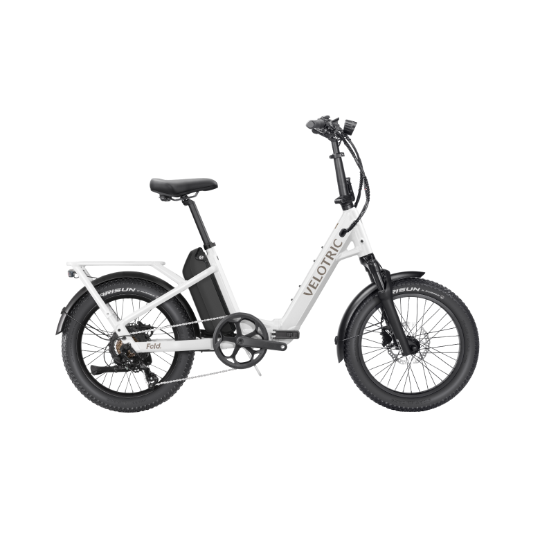 Pearl White Velotric Fold 1 Plus electric bike, folded, side view, against a plain background