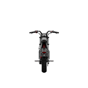 Side view of the eMOTO Segway Xyber electric bike parked outdoors, showcasing its rugged frame, large tires, and modern design features.