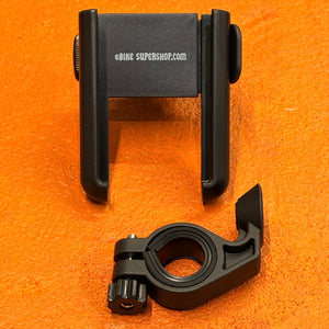 A black eBike phone mount securely attached to a bicycle handlebar, holding a smartphone in place.
