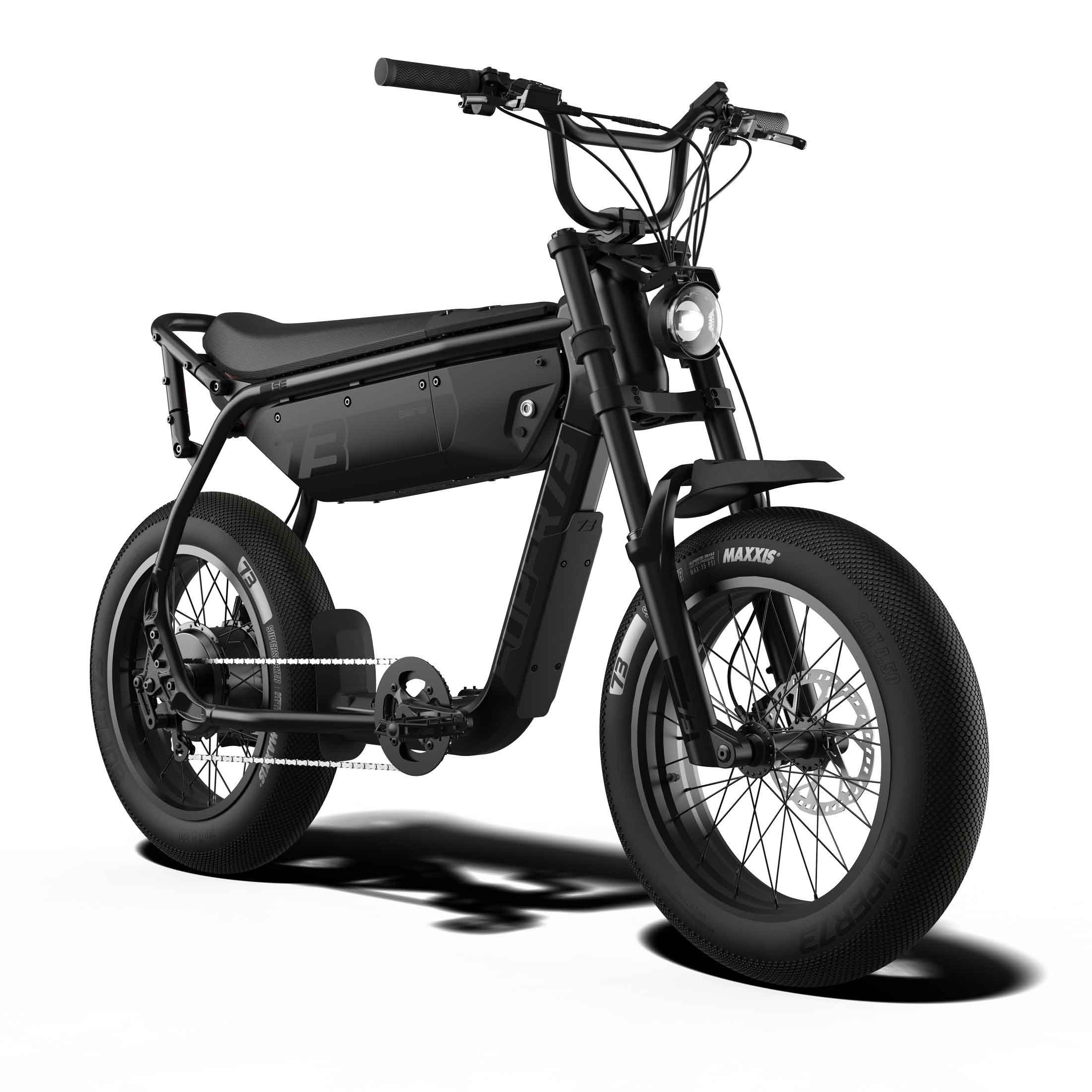 Side view of the eMOTO eBike Super73 B1G SE in a showroom, showcasing its black frame, thick tires, and minimalist design.