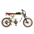 Side view of the eMOTO eBike Revi Cougar Pro in sand color, showcasing its sturdy frame, fat tires, and integrated battery on a plain background.