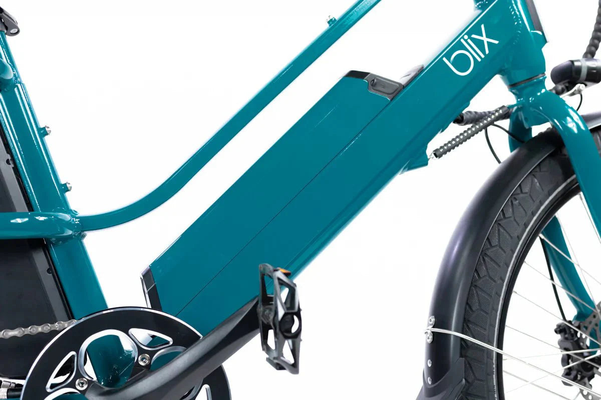 Blix Packa Genie Step-Thru 750W electric cargo eBike in white, shown with rear cargo rack and front basket, side view.